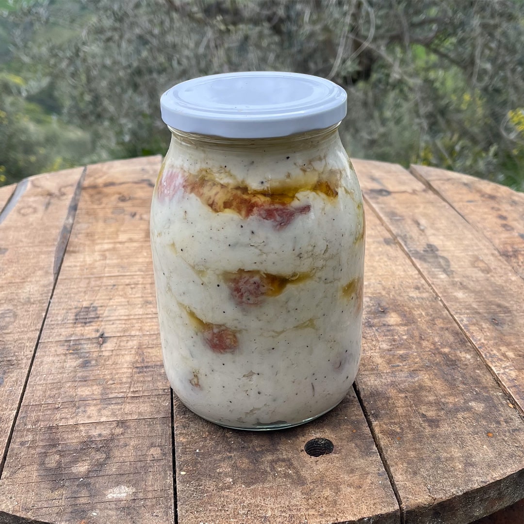 Salsiccette conservate in lardo di maiale macinato condito